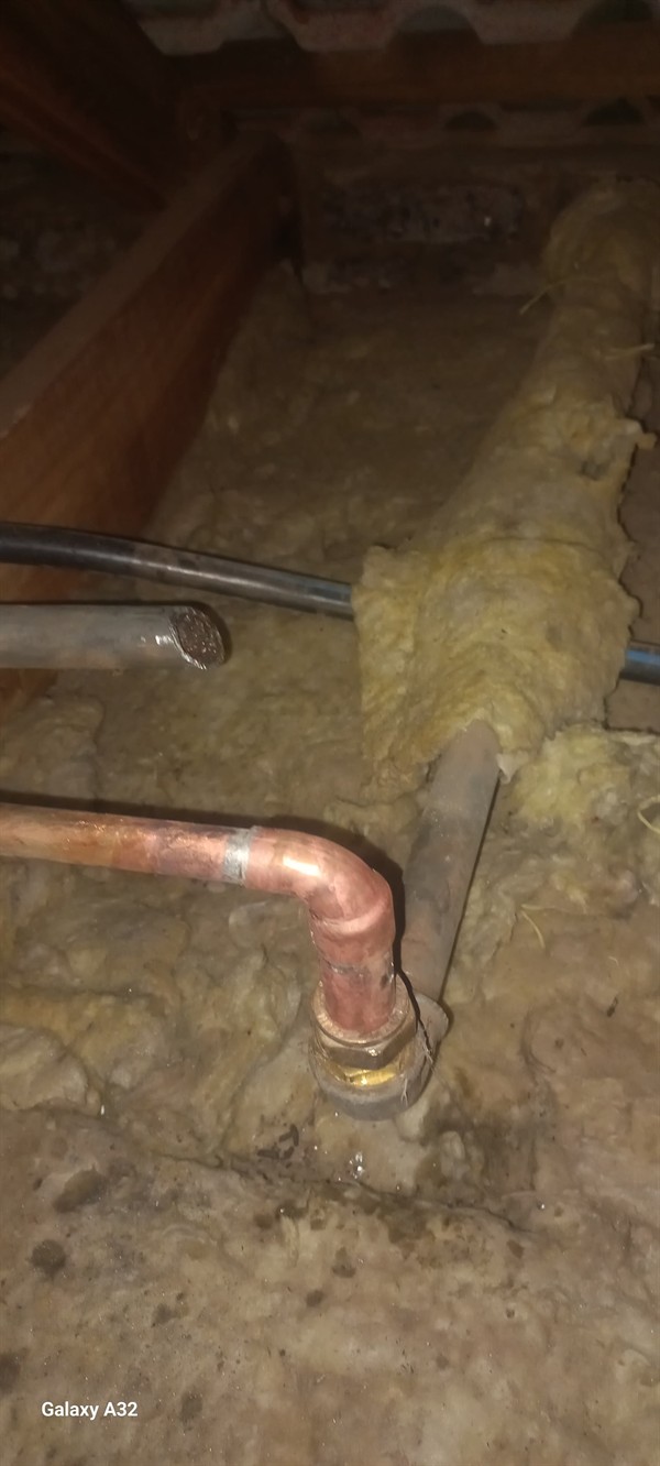 Water leaking from ceiling due to burst pipe behind plaster in Ola Competition