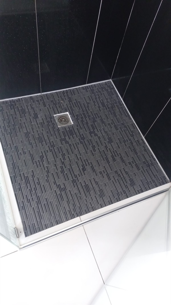 Blocked shower drain during professional repair