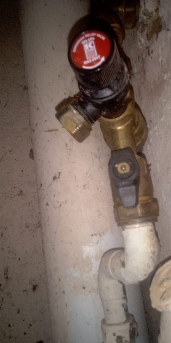 Open geyser showing heating element and thermostat repair work in Koppie Smuts with exposed wiring and internal components