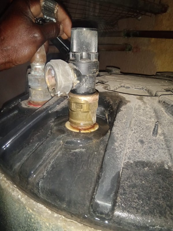 Open geyser showing heating element and thermostat repair work in Elandsfontein Rail with exposed wiring and internal components