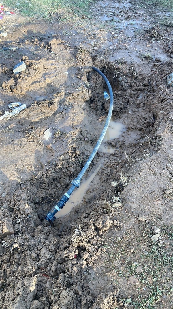 Wet patches appearing from burst underground pipe in Sandringham