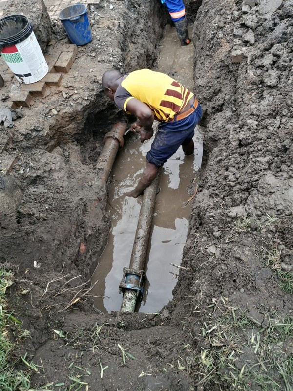 Open hot water geyser during thermostat and element repair in Atholl with internal components visible