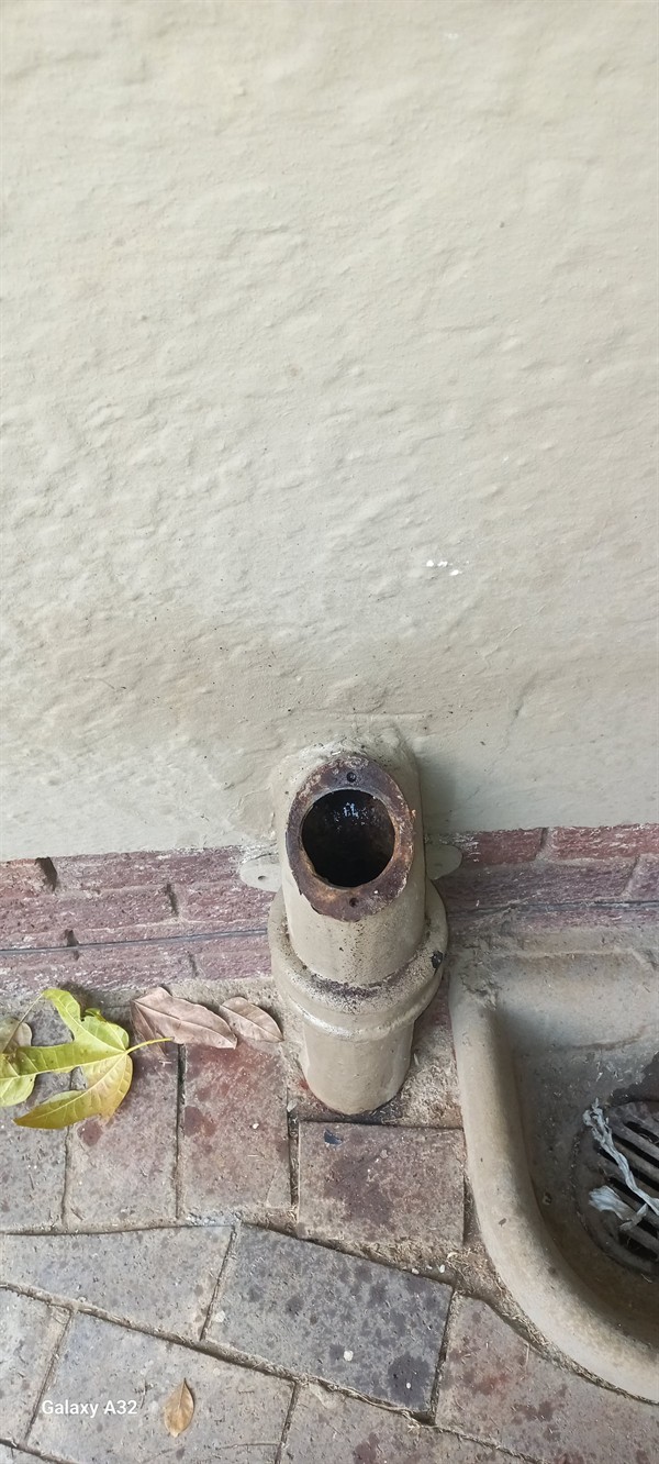 Technician repairing open geyser element and thermostat in East Bank with exposed wiring and heating components