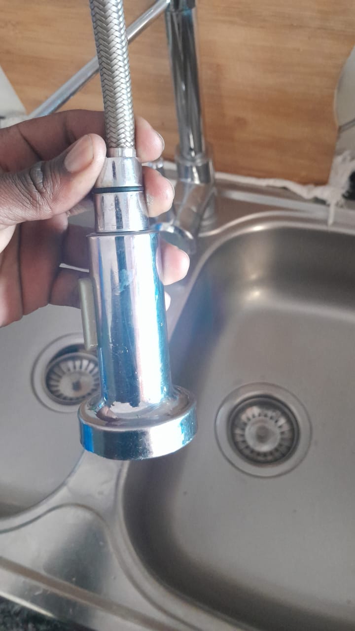 Kitchen sink mixer replacement in Linden showing new tap installed after leaking mixer removed and plumbing connections secured for proper water flow