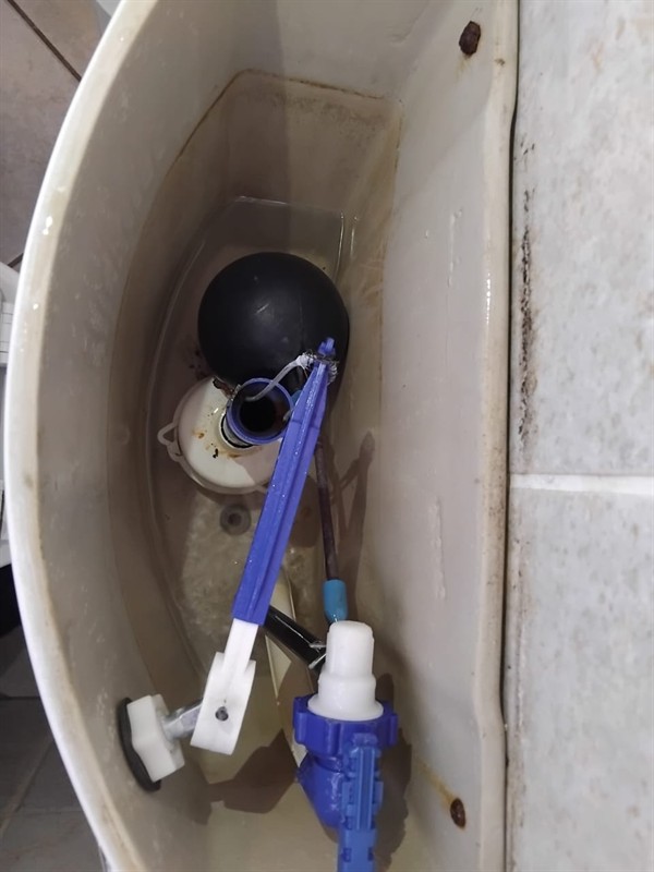 Open geyser showing heating element and thermostat repair work in Krugersrus with exposed wiring and internal components