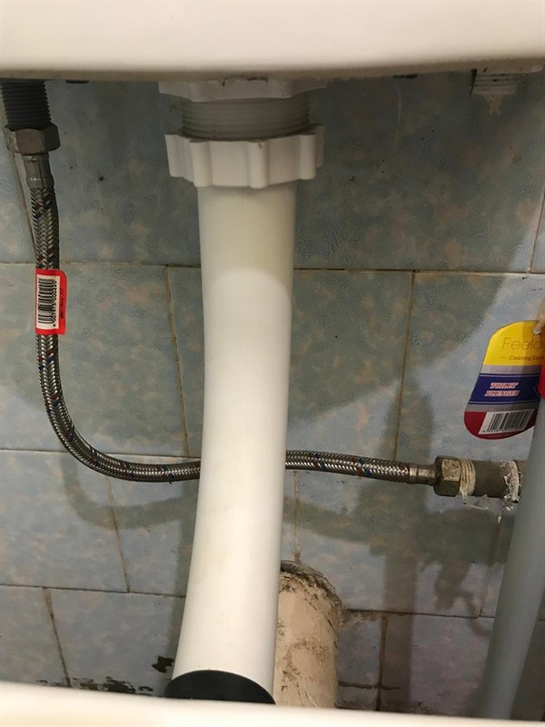 Open geyser showing heating element and thermostat repair work in Sandown with exposed wiring and internal components