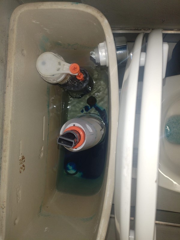 Open hot water geyser during thermostat and element repair in Vereeniging North with internal components visible