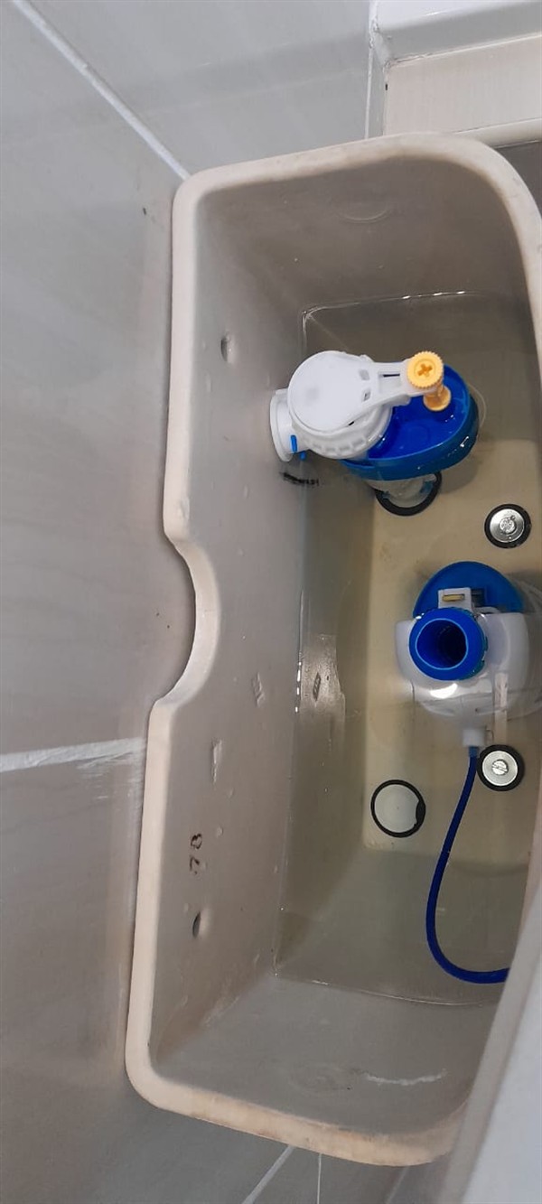 Ceiling mounted geyser opened during element and thermostat repair in Nigel CBD showing internal wiring