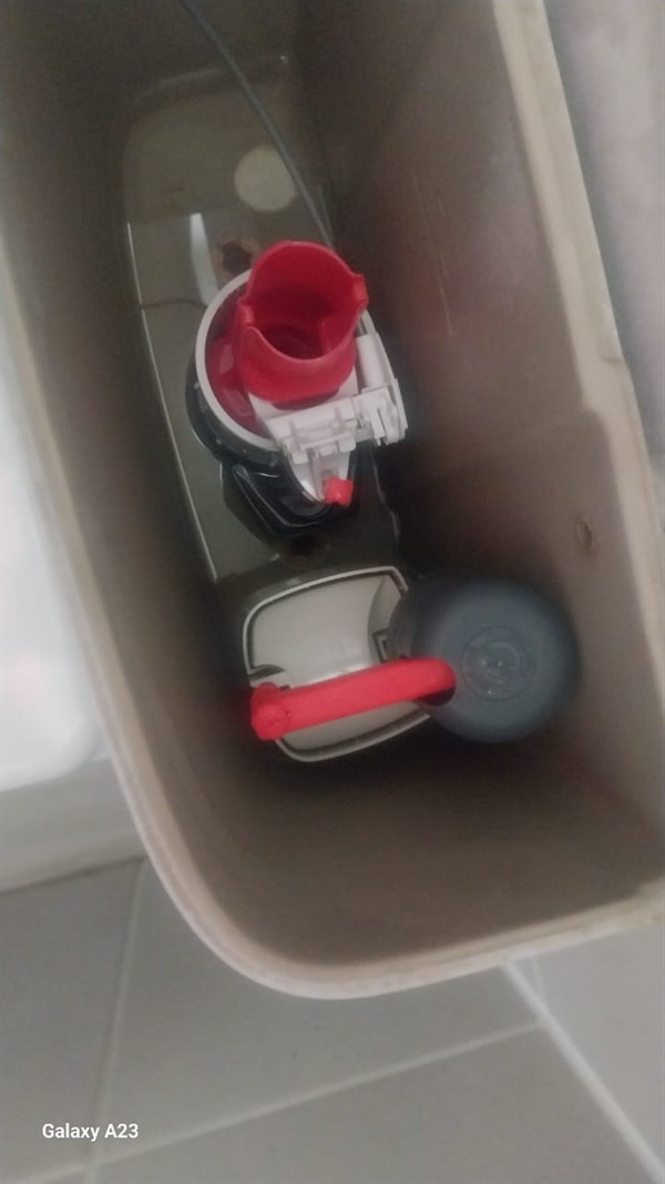 Ceiling mounted geyser opened during element and thermostat repair in Persida showing internal wiring