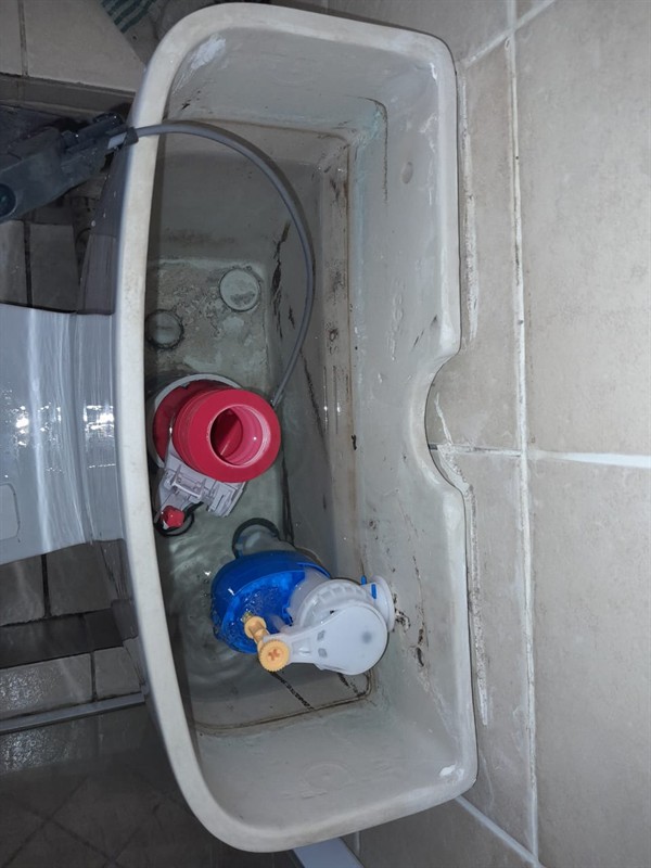 Open geyser showing heating element and thermostat repair work in Pretoria Industrial with exposed wiring and internal components