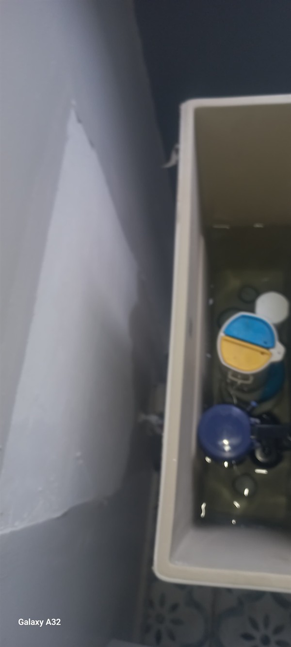 Technician repairing open geyser element and thermostat in Brakfontein with exposed wiring and heating components