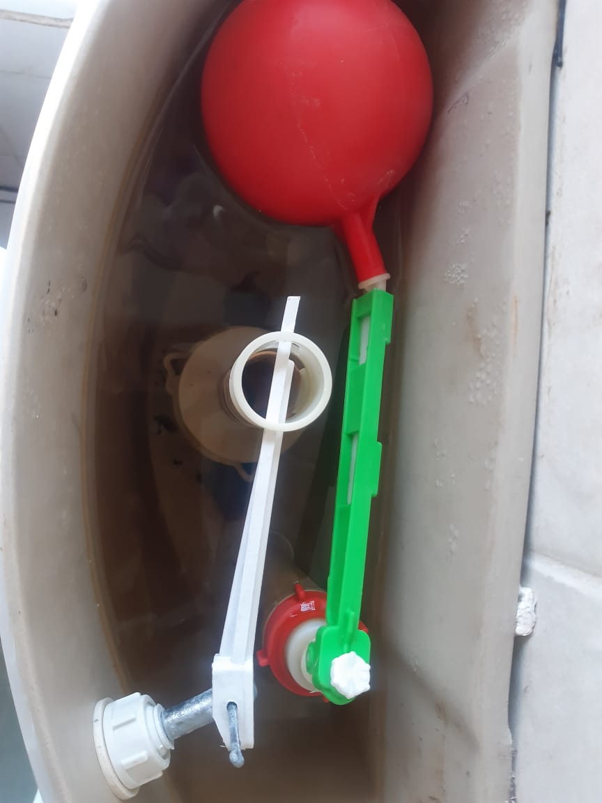Toilet cistern in Kempton Park showing new float valve and internal flush components during toilet leak repair and maintenance.