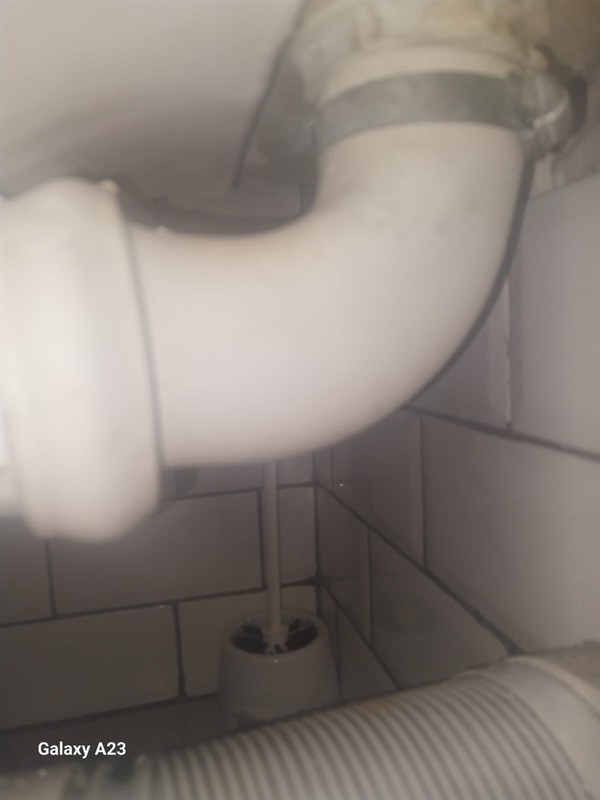 Open geyser showing heating element and thermostat repair work in Esther Park with exposed wiring and internal components