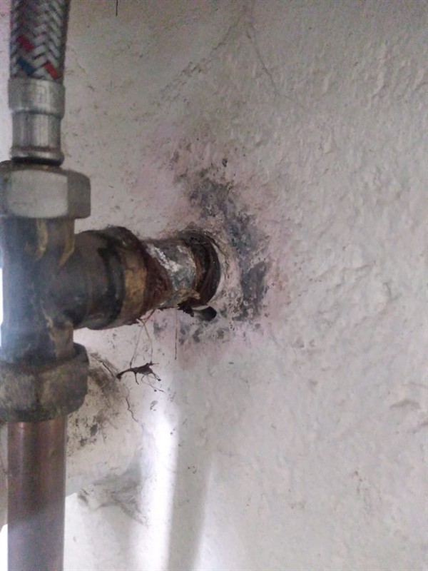 Flooding from burst outside pipe visible in Ejees