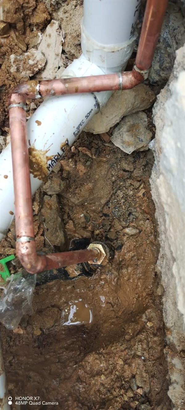 Soaking soil from burst outside pipe in Silverfields Park