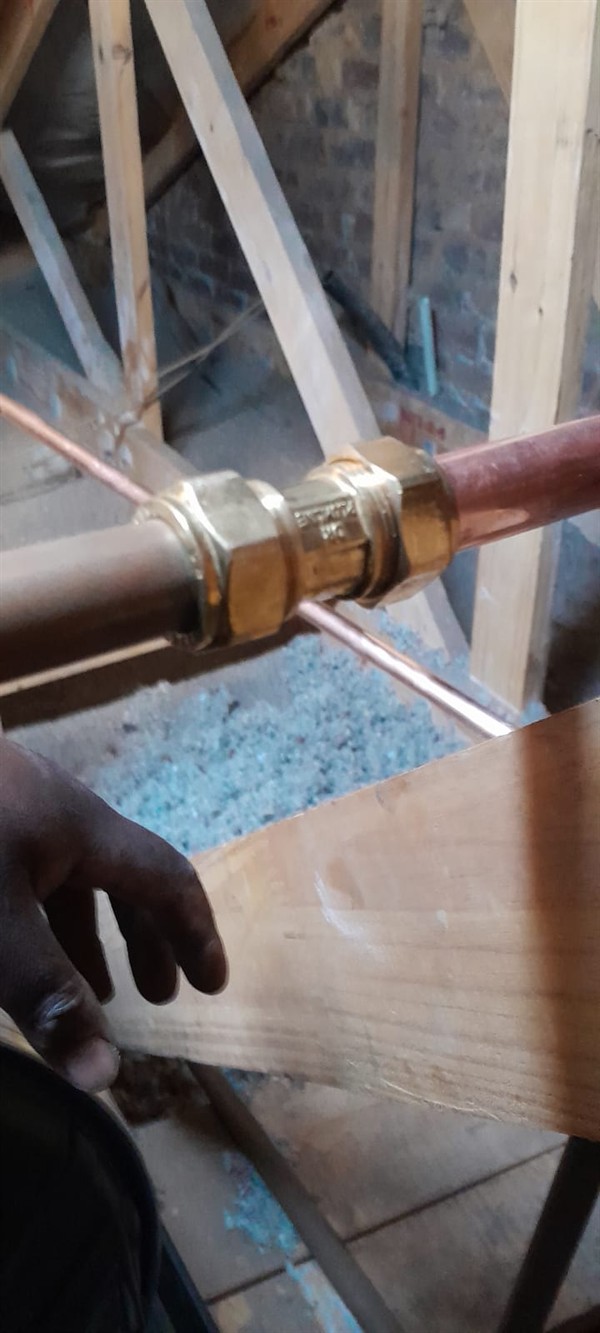 Worsening ceiling leak from burst pipe in Nasrec