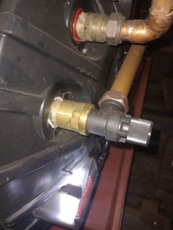 Open geyser showing heating element and thermostat repair work in Kaalspruit with exposed wiring and internal components