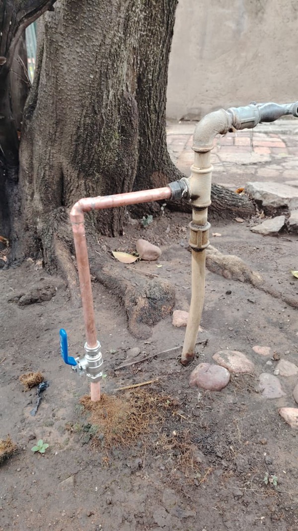 Steady leaking across ground from burst outside pipe in Witpoortjie