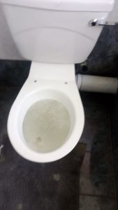 What should I do if my toilet overflows in the middle of the night?