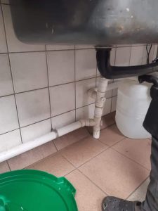 why is my kitchen sink draining slowly